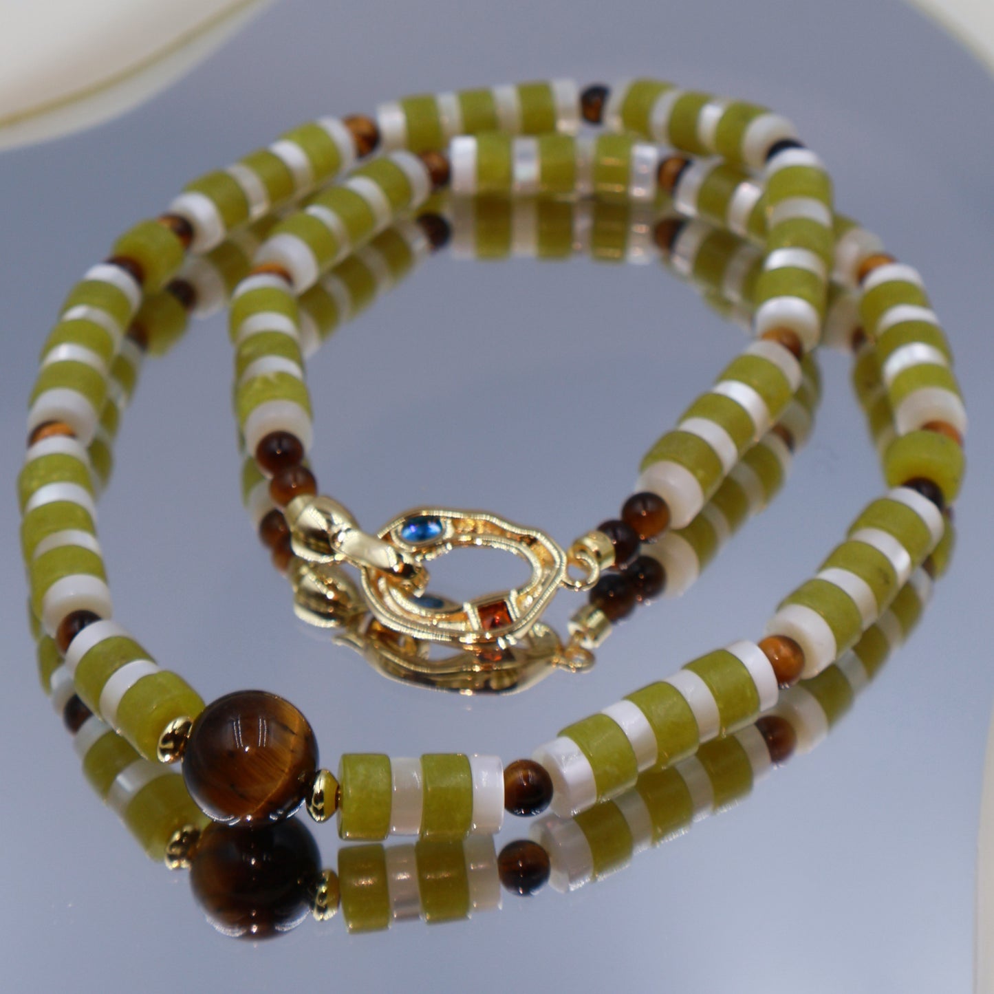 Handmade natural stone necklace with tiger's eye accents & blue-stone clasp