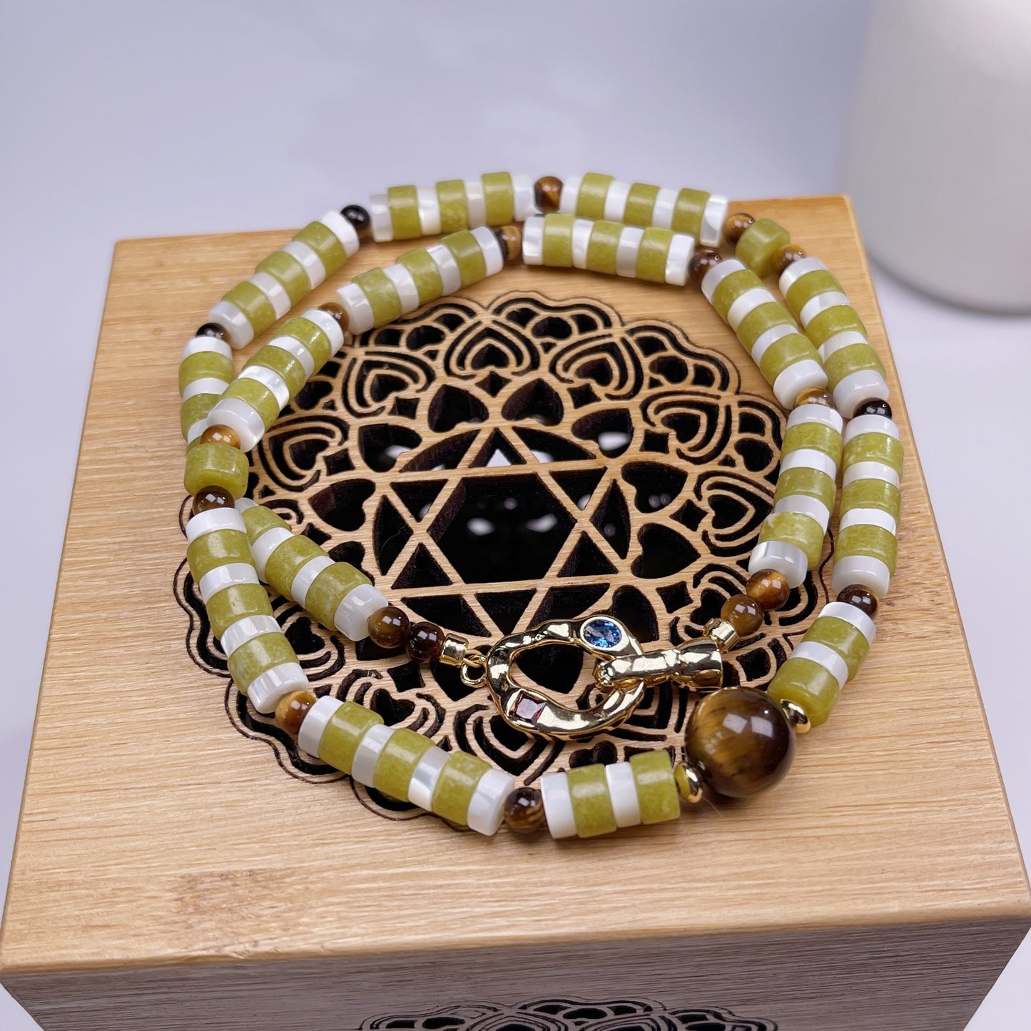 Handmade natural stone necklace with tiger's eye accents & blue-stone clasp